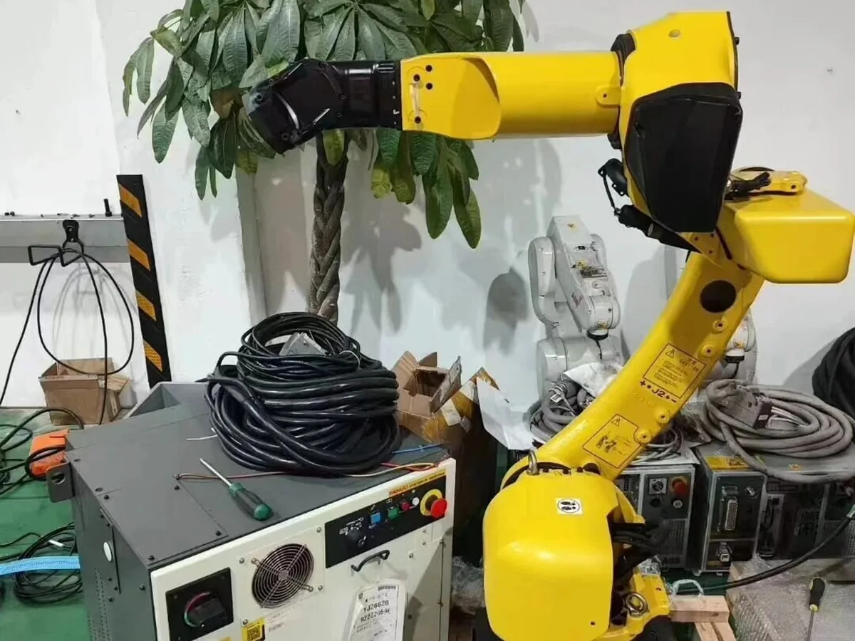 FANUC 6-axis robot arm in workshop stock